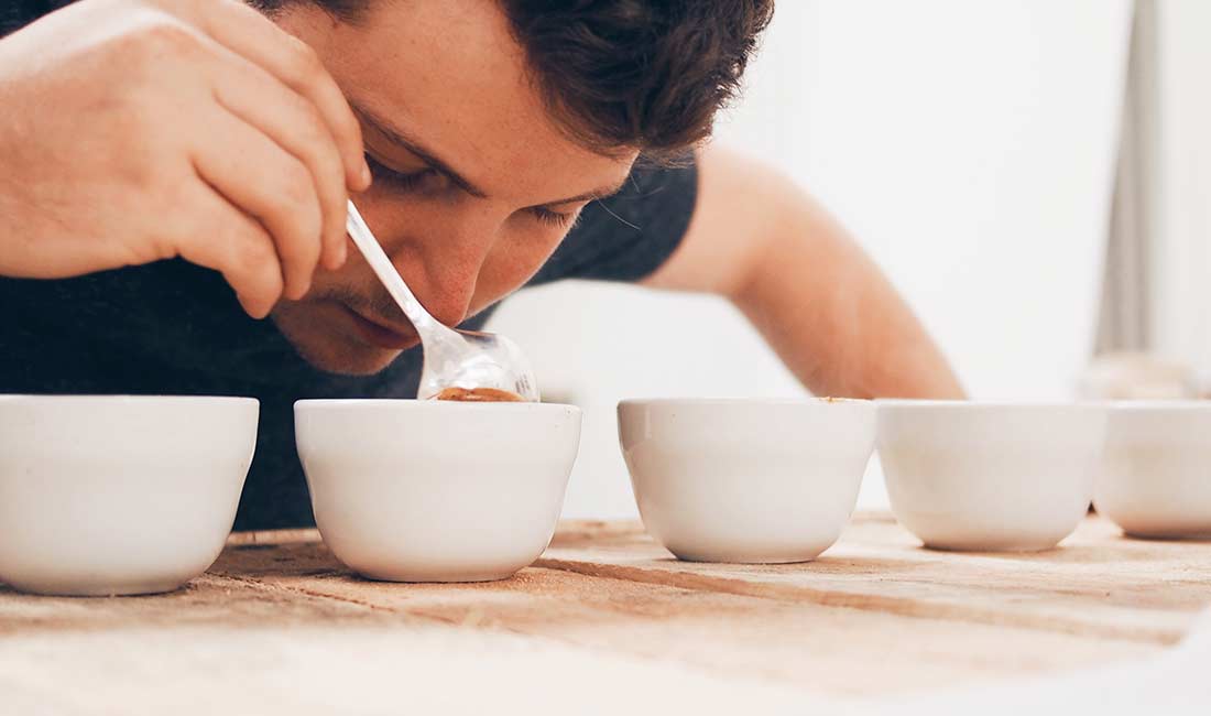 Setting up a coffee cupping session, Breaking the Crust Aroma.